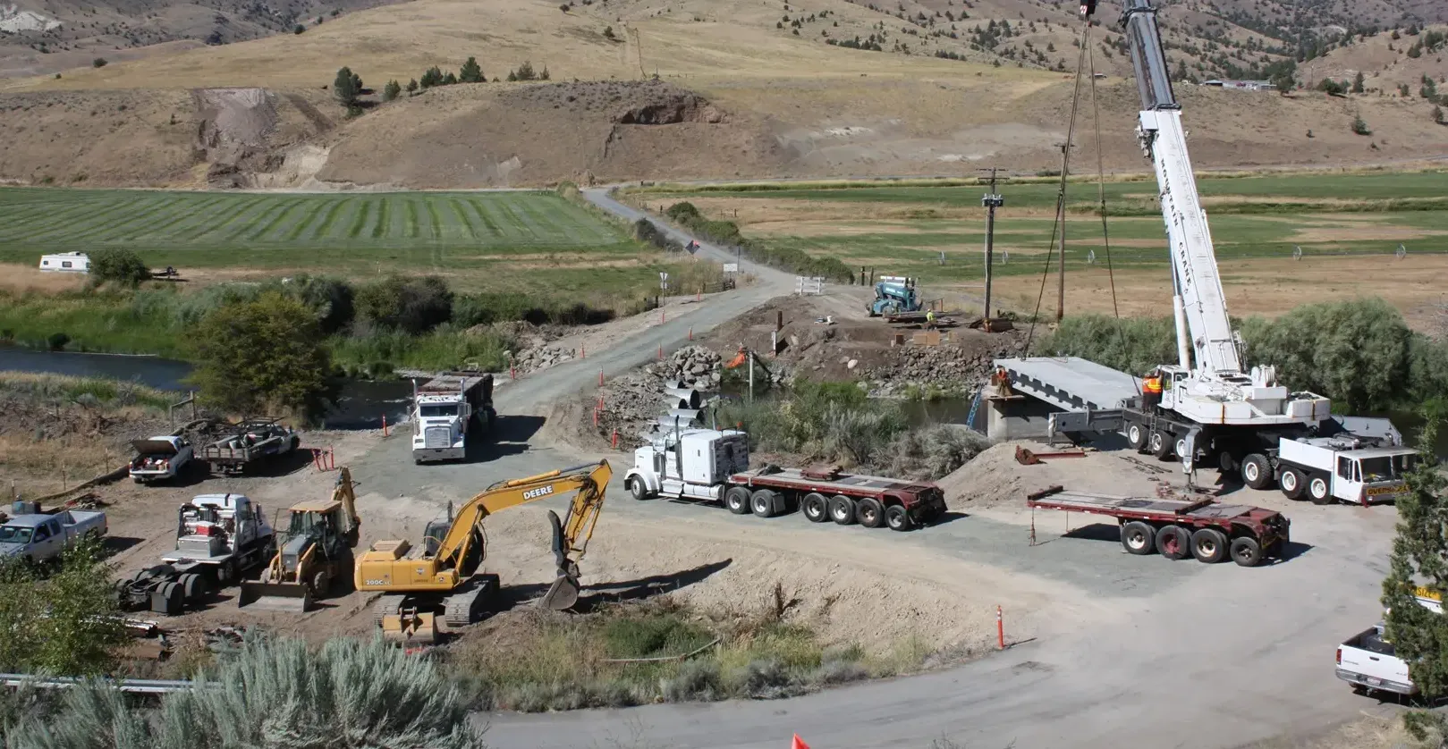 Deschutes Concrete Construction was hired as the general contractor by the BLM to replace this bridge’s superstructure. The bridge crosses the John Day River near Dayville, Oregon. In order to allow traffic to still cross the river, Deschutes installed seven 60